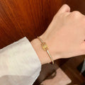 Elegant Gold-Plated Bangle Bracelet with Cubic Zirconia