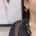 Louis Vuitton Gold LV Initial Earrings - Statement Studs