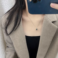 Chanel Silver Cube CC Logo Necklace - Modern Elegance