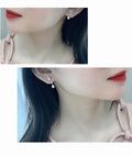 Chanel Silver Rose Drop Earrings - Designer Dangle Style