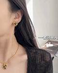 Chanel Gold Heart CC Logo Earrings - Iconic Design