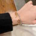 Dior Gold Crystal Letter Bracelet - Chic & Timeless